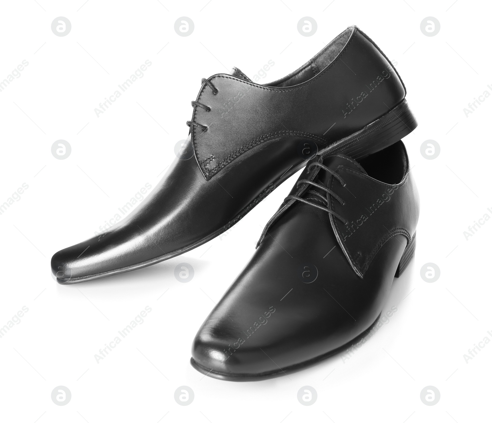 Photo of Elegant male shoes on white background