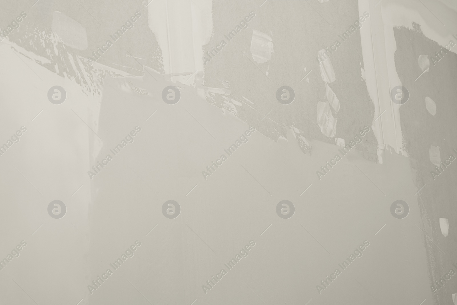 Photo of Wall covered with plaster as background, closeup