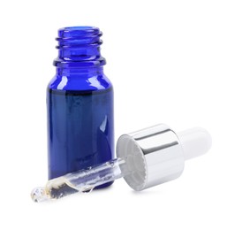 Photo of Blue bottle and pipette with tincture isolated on white