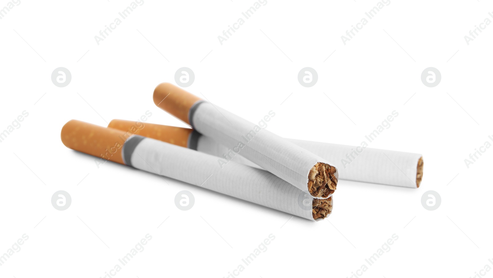 Photo of Cigarettes with orange filters isolated on white