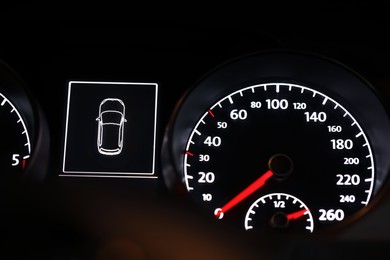 Photo of Closeup view of dashboard with speedometer in modern car
