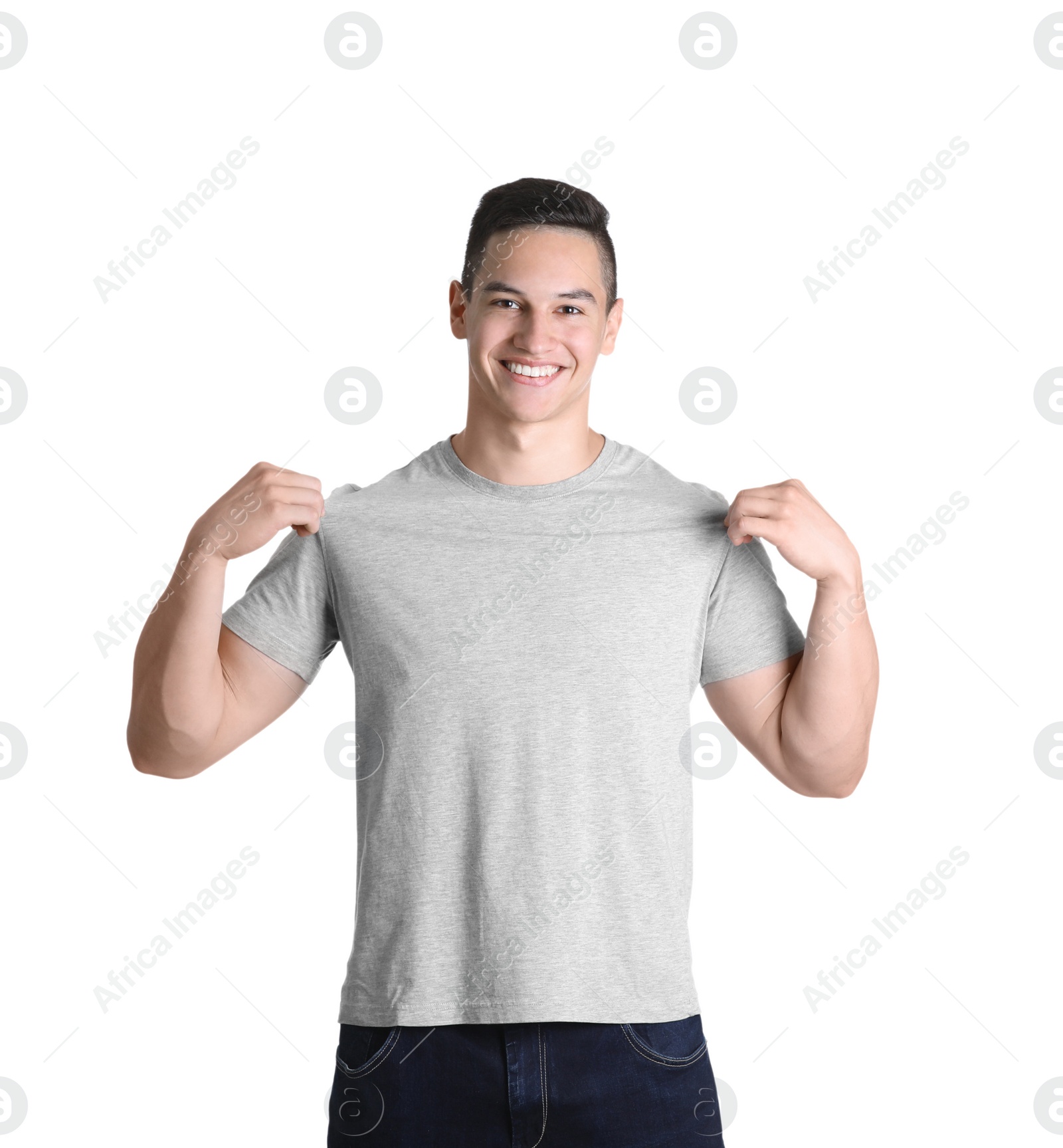 Photo of Young man in grey t-shirt on white background. Mockup for design