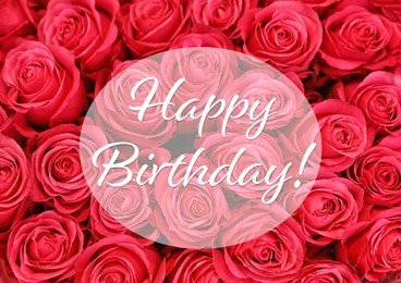 Image of Happy Birthday! Beautiful red roses as background, top view