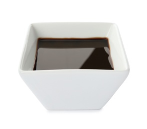 Photo of Dish of soy sauce on white background