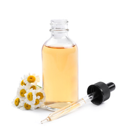 Photo of Composition with chamomile flowers and cosmetic oil on white background