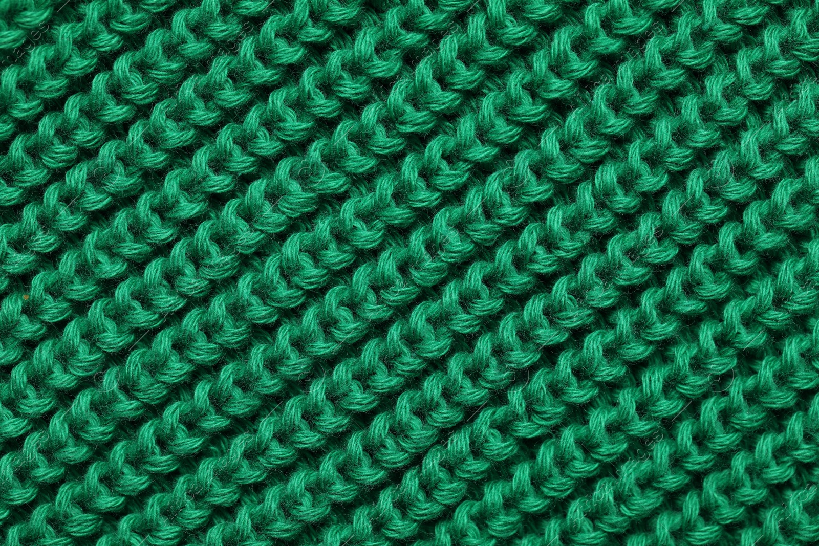 Photo of Texture of soft green fabric as background, top view