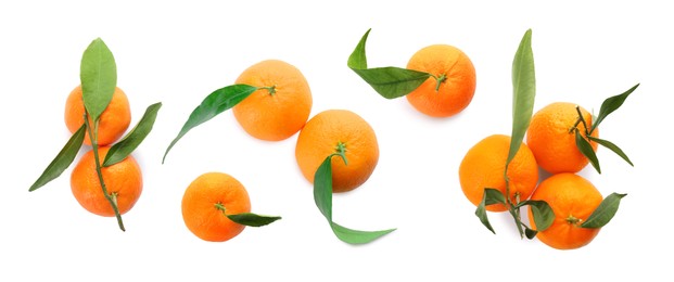 Image of Set with fresh ripe tangerines on white background, top view. Banner design