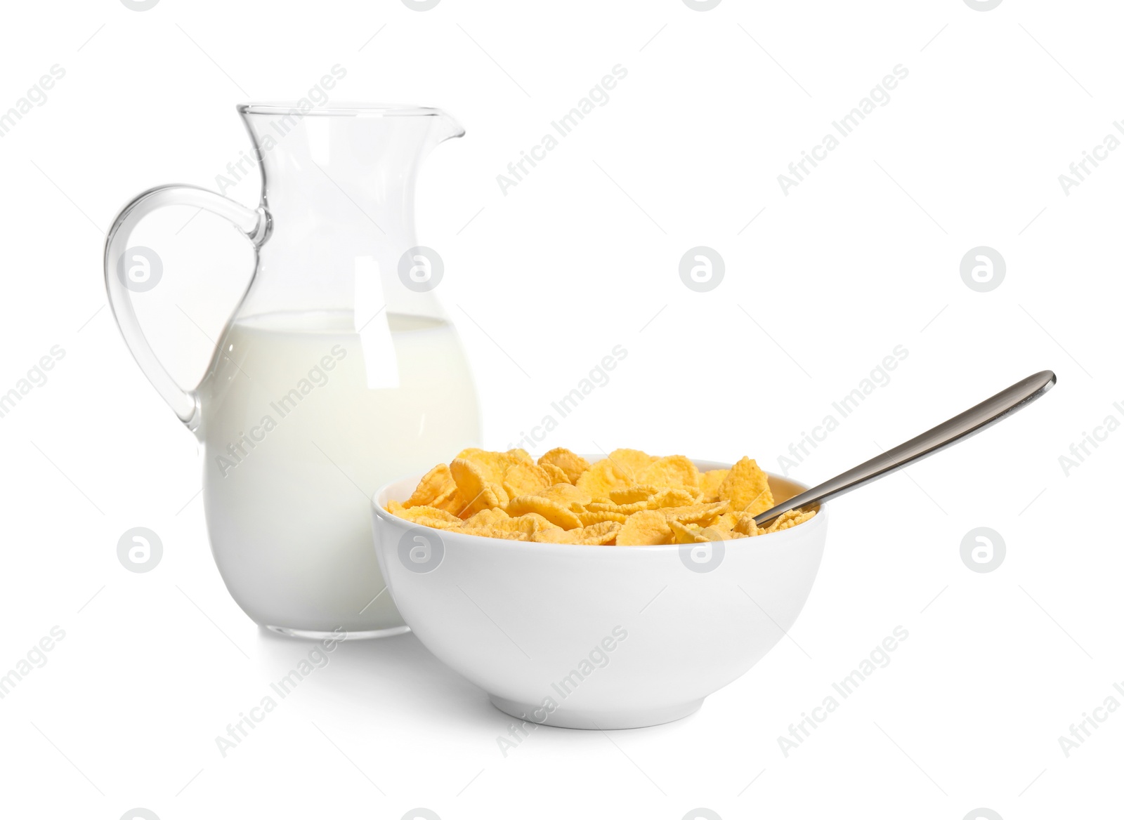 Photo of Milk and corn flakes on white background