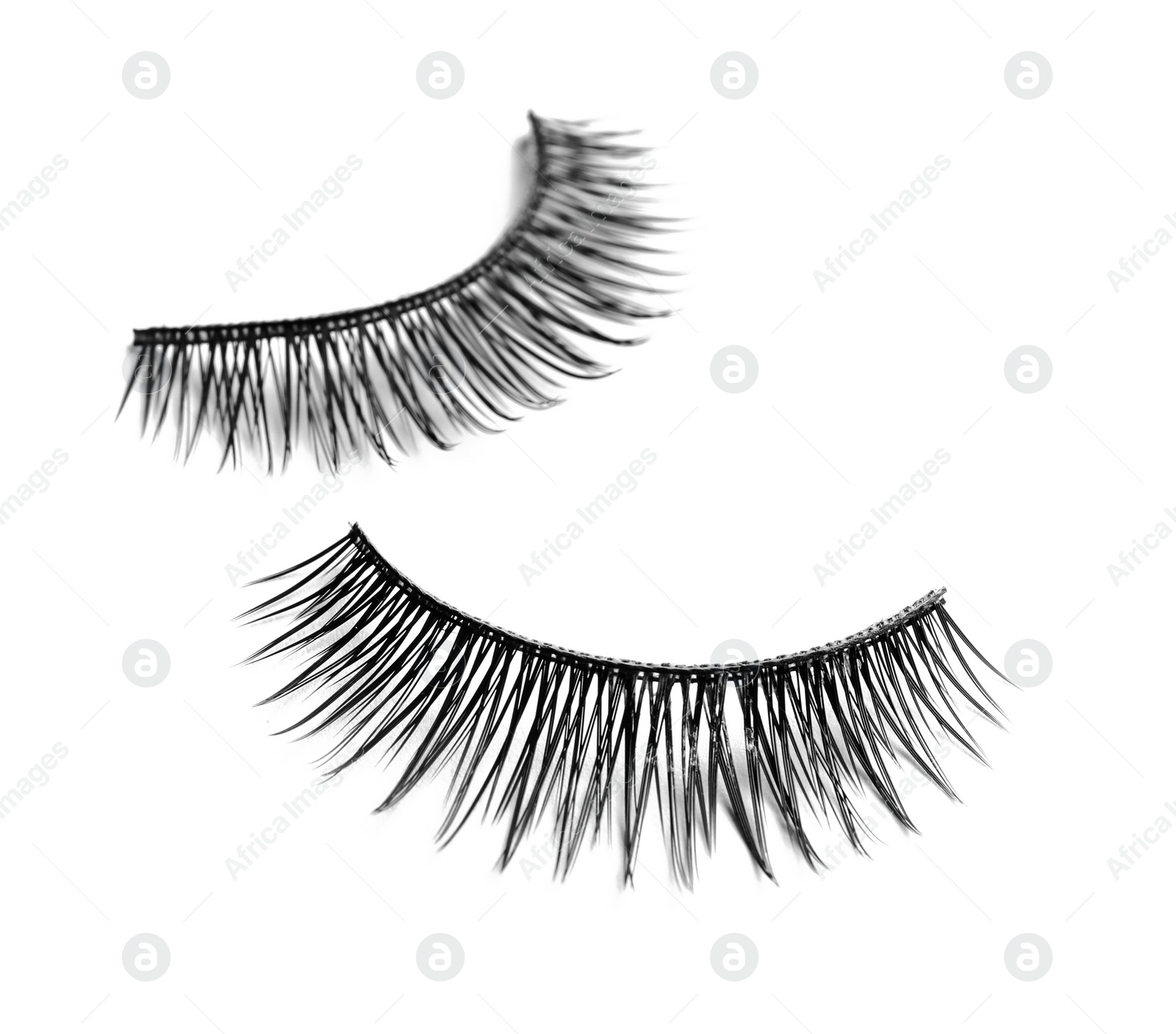 Photo of False eyelashes on white background