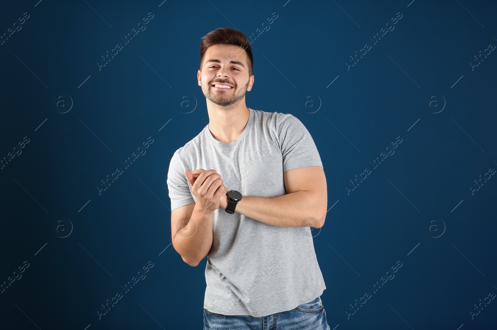 Photo of Portrait of handsome man on color background