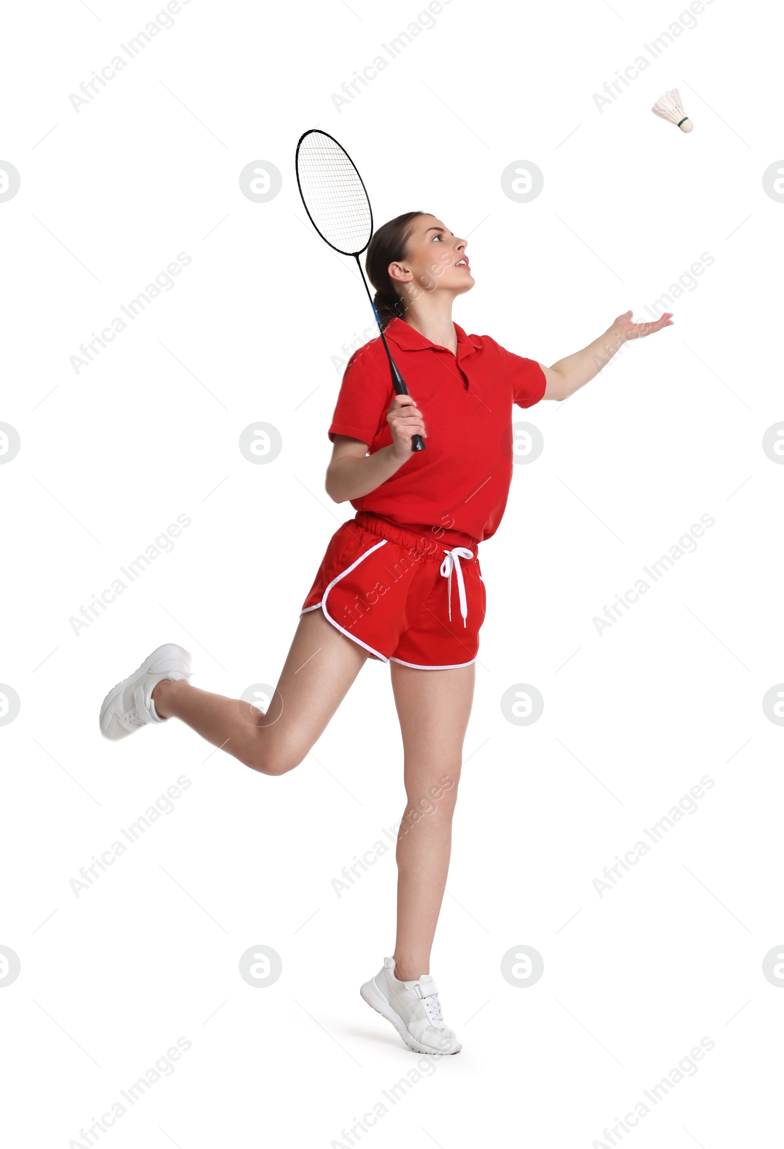 Photo of Young woman playing badminton with racket on white background