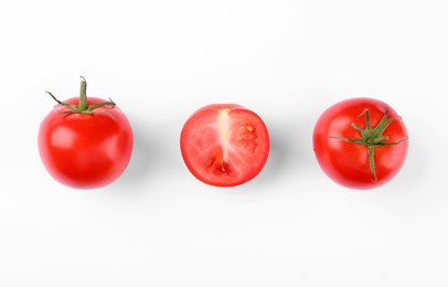 Whole and ripe red tomatoes on white background, top view