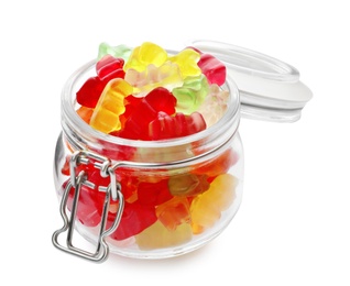 Glass jar with delicious jelly bears on white background