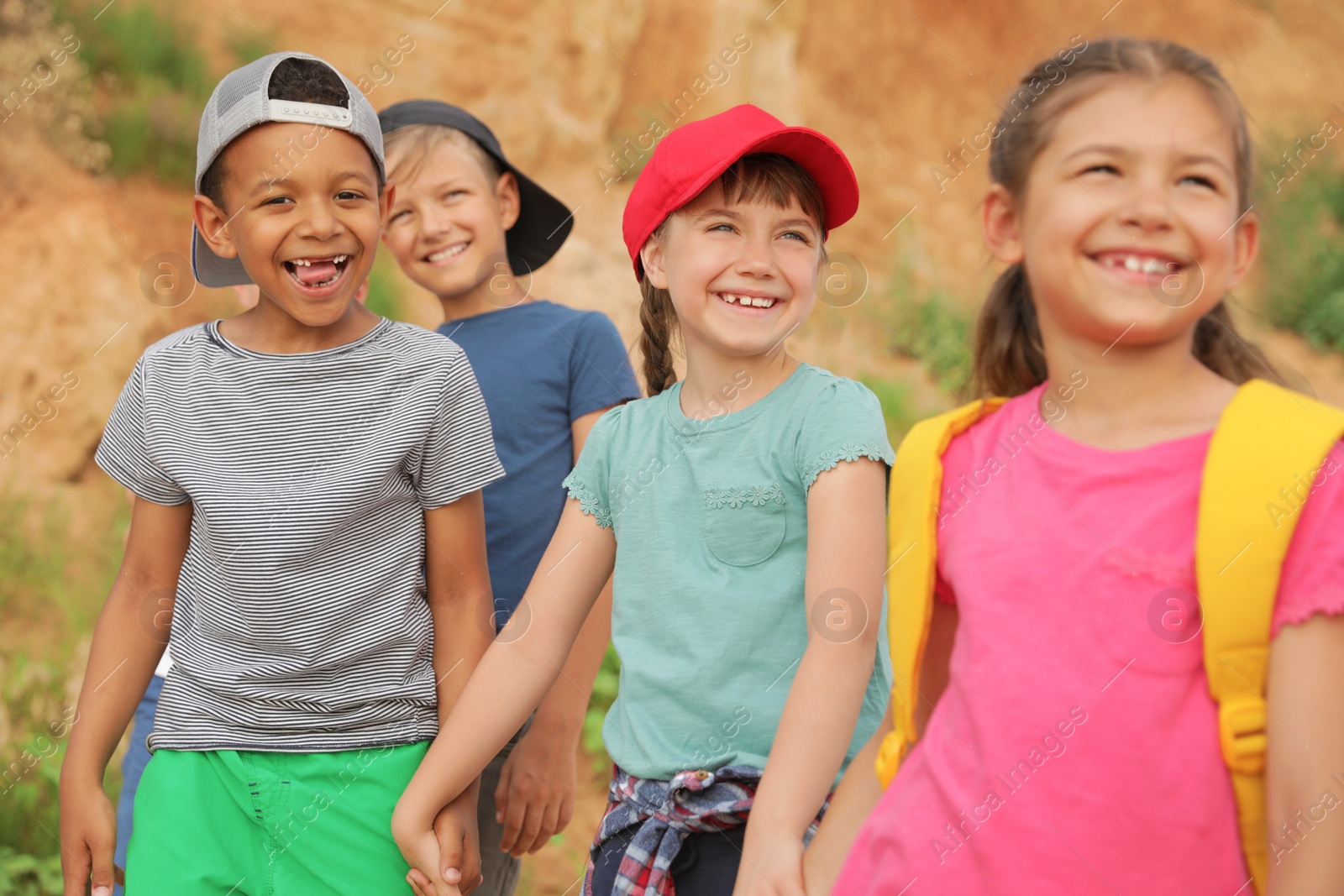 Photo of Cute little children outdoors on summer day. Camping trip