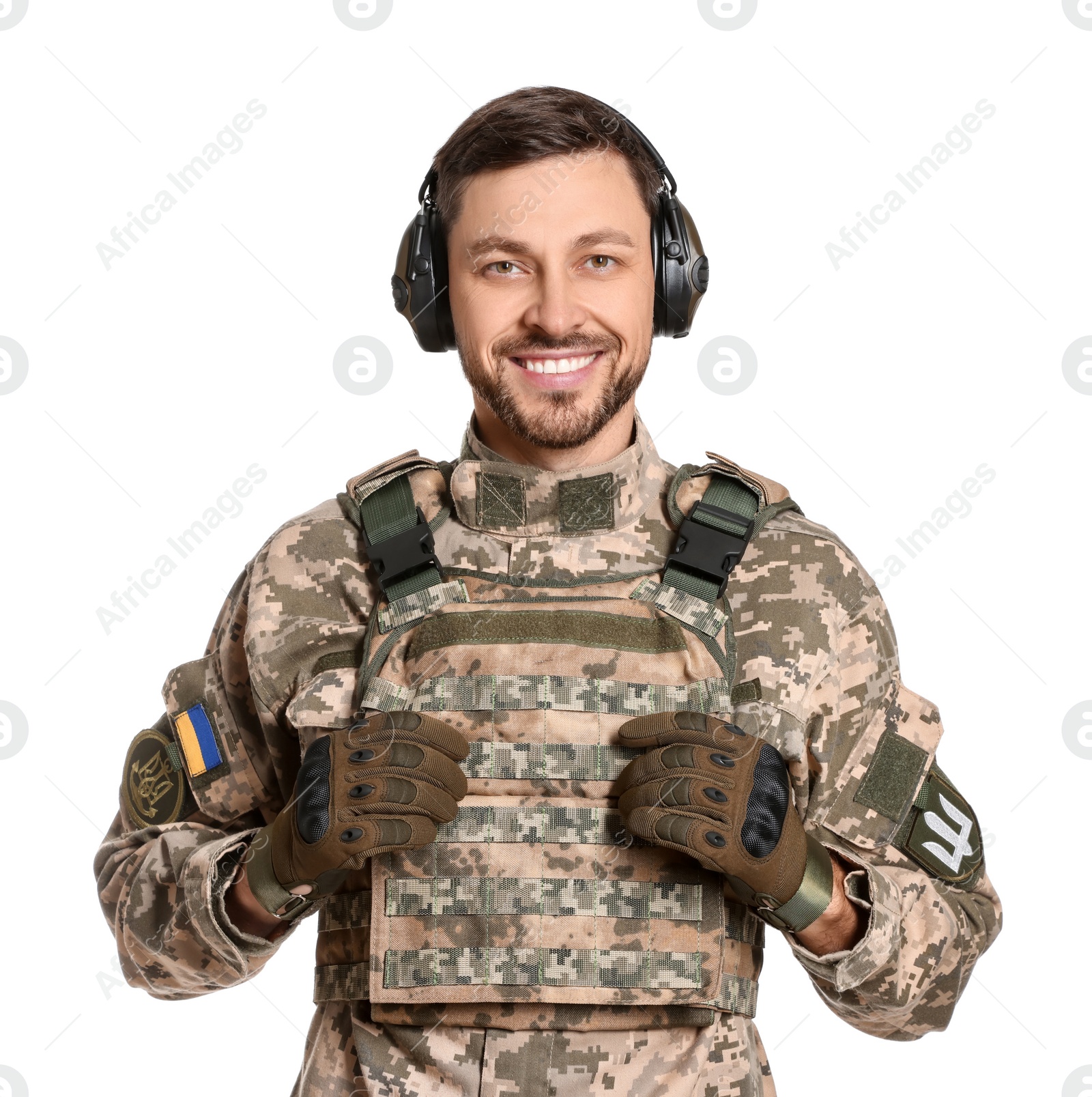 Photo of Ukrainian soldier in military uniform and active tactical headphones on white background