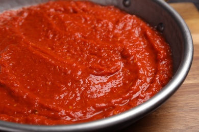 Photo of Delicious tomato sauce in pan, closeup view