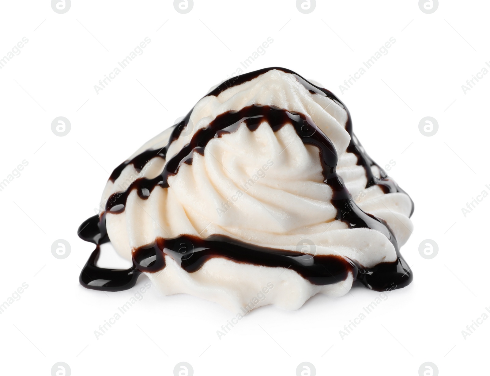 Photo of Delicious fresh whipped cream with chocolate syrup isolated on white