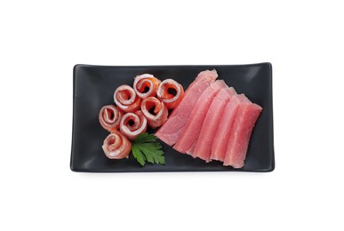Tasty sashimi (slices of fresh raw tuna and salmon) with parsley isolated on white, top view