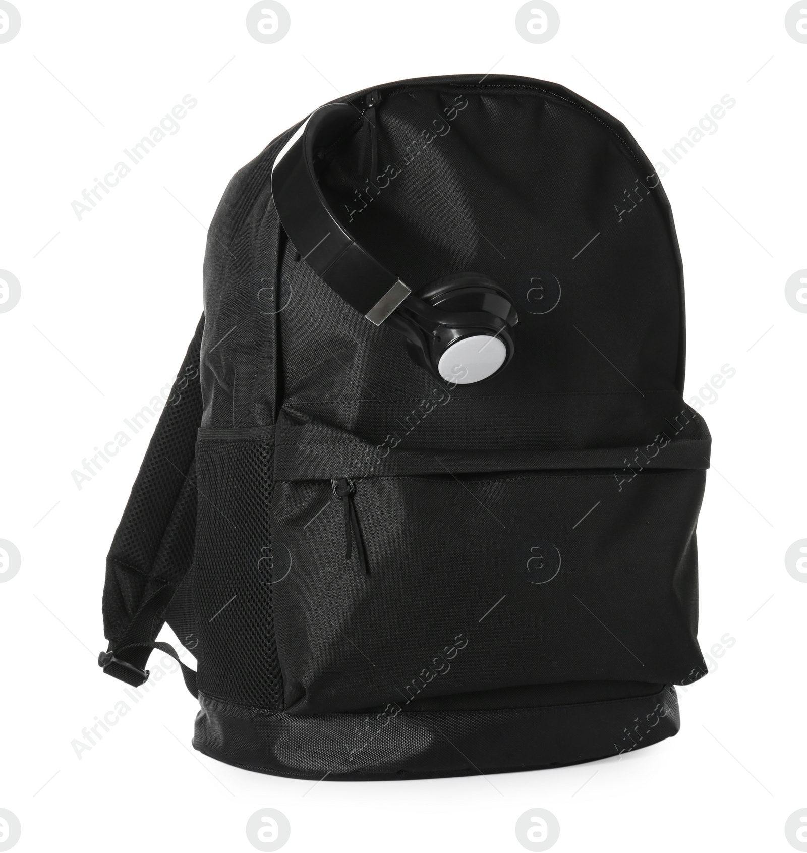 Photo of Black backpack with headphones on white background