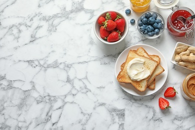 Flat lay composition with toast bread and toppings on marble background