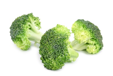 Photo of Fresh green broccoli on white background. Organic food