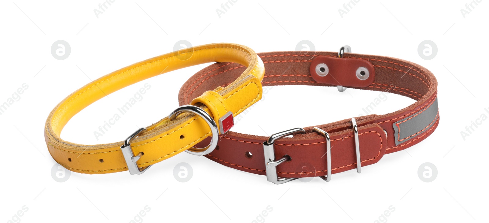 Photo of Different leather dog collars on white background