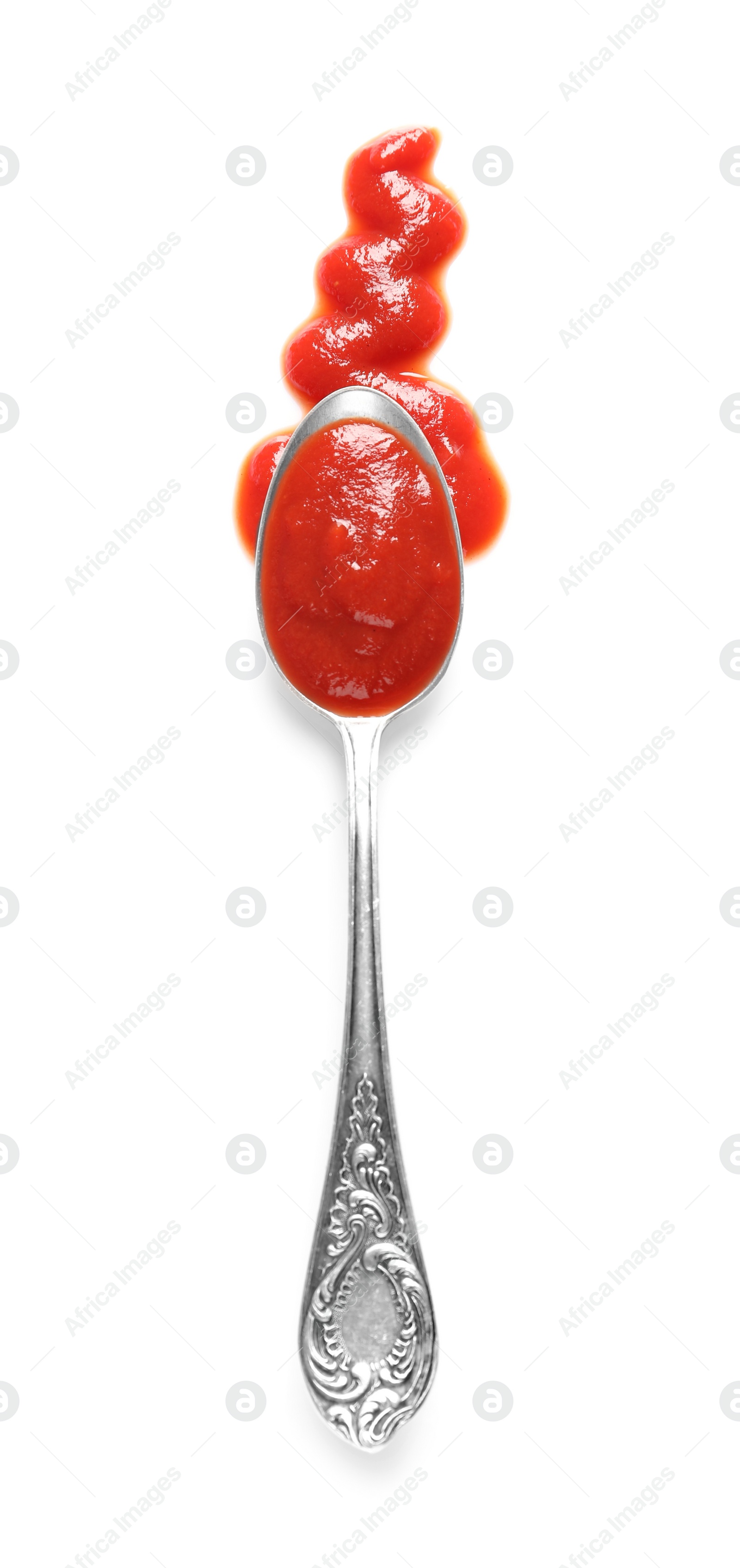 Photo of Delicious tomato sauce and spoon on white background, top view