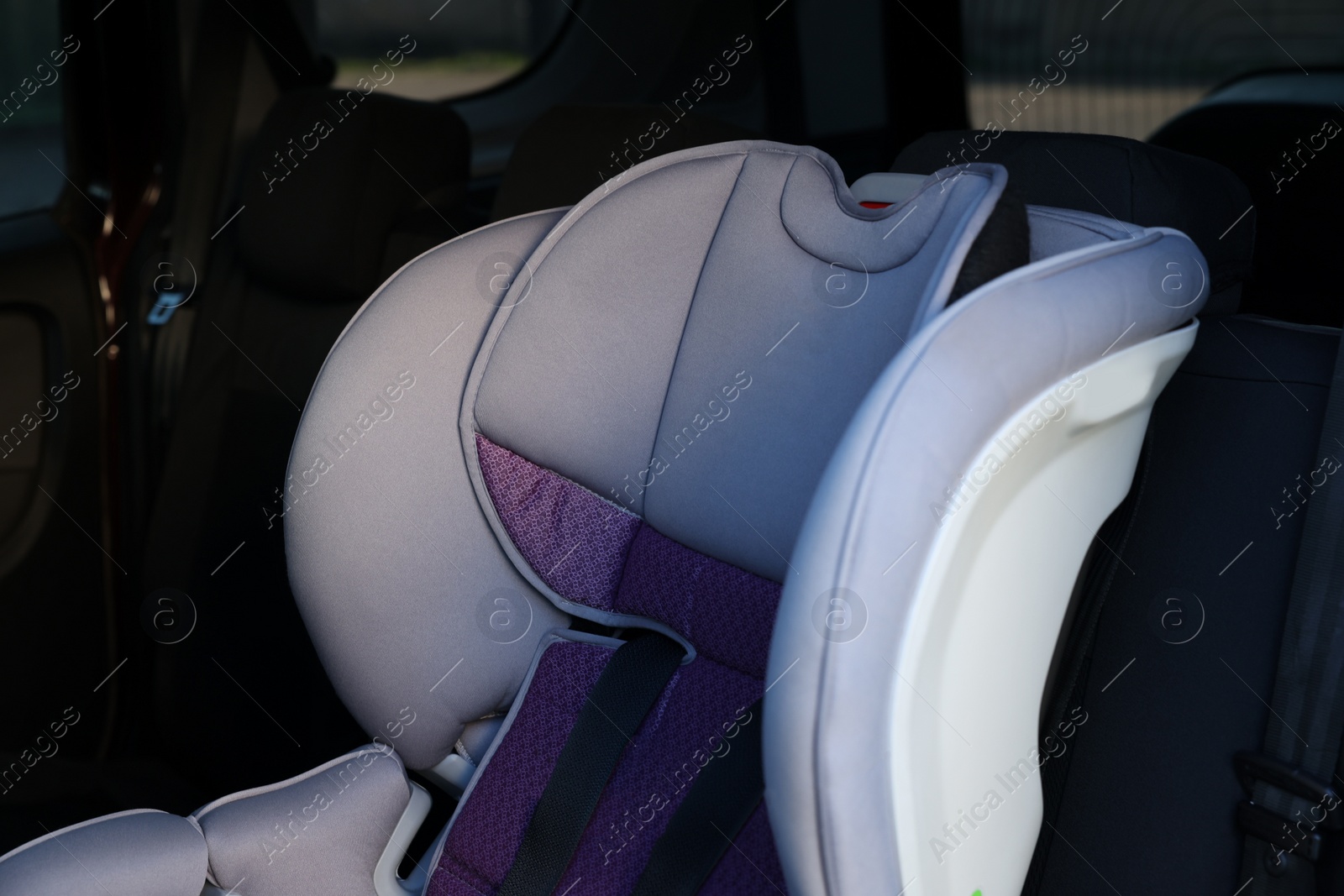 Photo of Empty modern child safety seat inside car