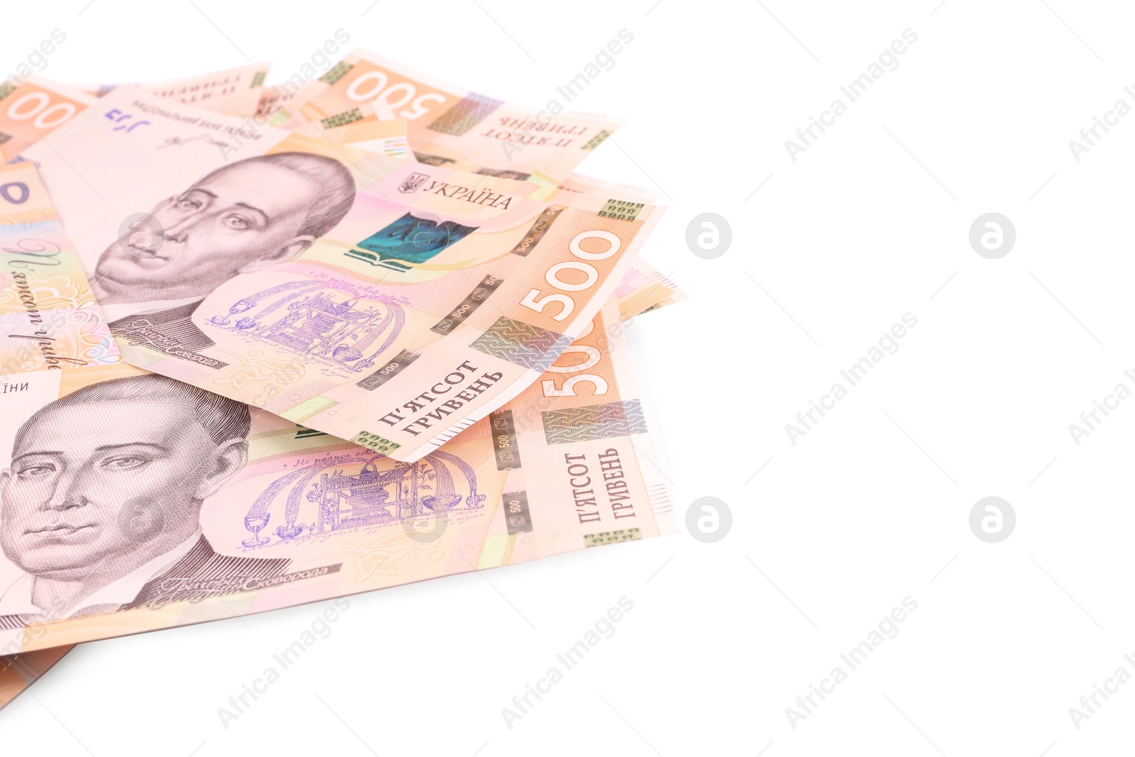 Photo of 500 Ukrainian Hryvnia banknotes on white background