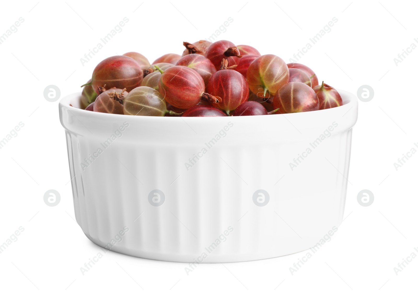 Photo of Ceramic bowl full of ripe gooseberries isolated on white