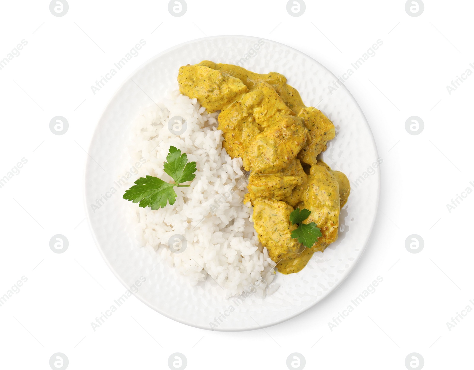 Photo of Delicious rice and chicken with curry sauce isolated on white, top view