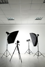 Photo of Interior of modern photo studio with professional equipment