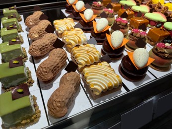 Showcase with different tasty desserts in store