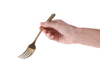 Woman with shiny golden fork on white background, closeup