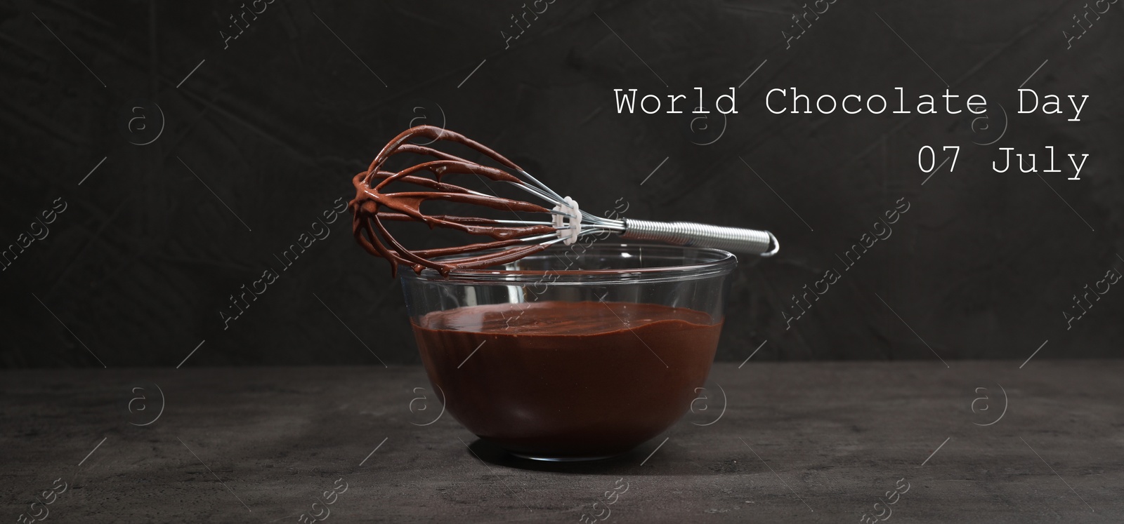 Image of World Chocolate Day - July 7. Bowl and whisk with yummy chocolate cream on black table. Banner design