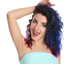 Photo of Young woman with bright dyed hair on white background