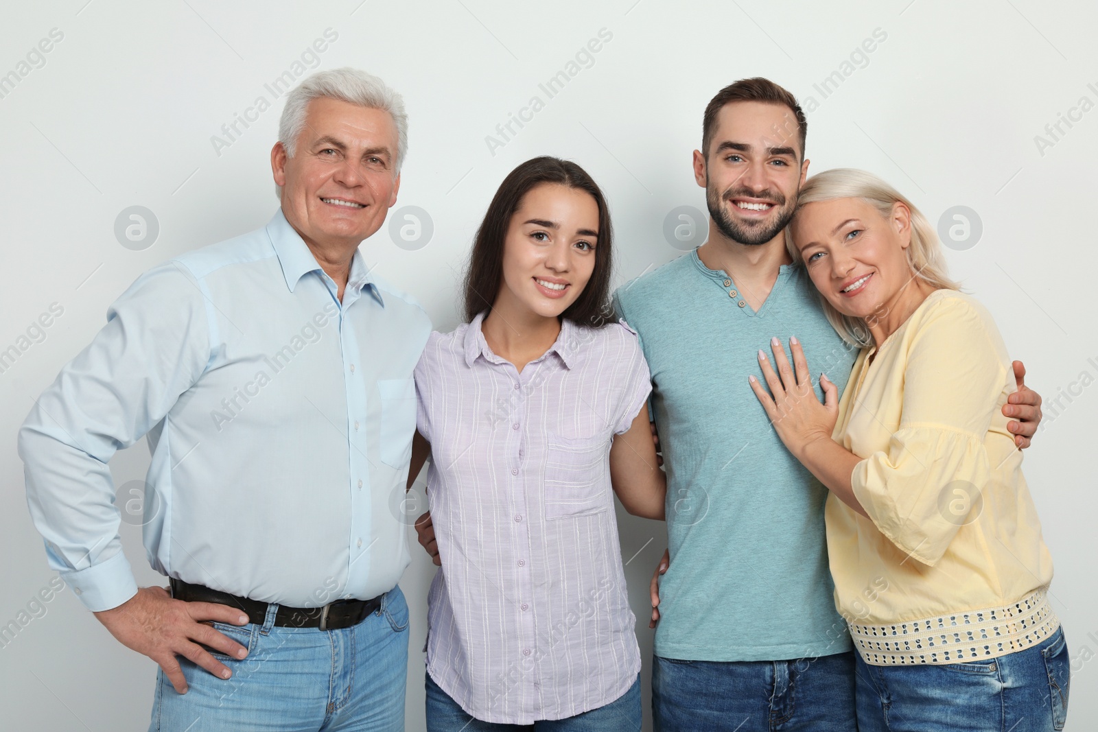 Photo of Portrait of happy family on white background