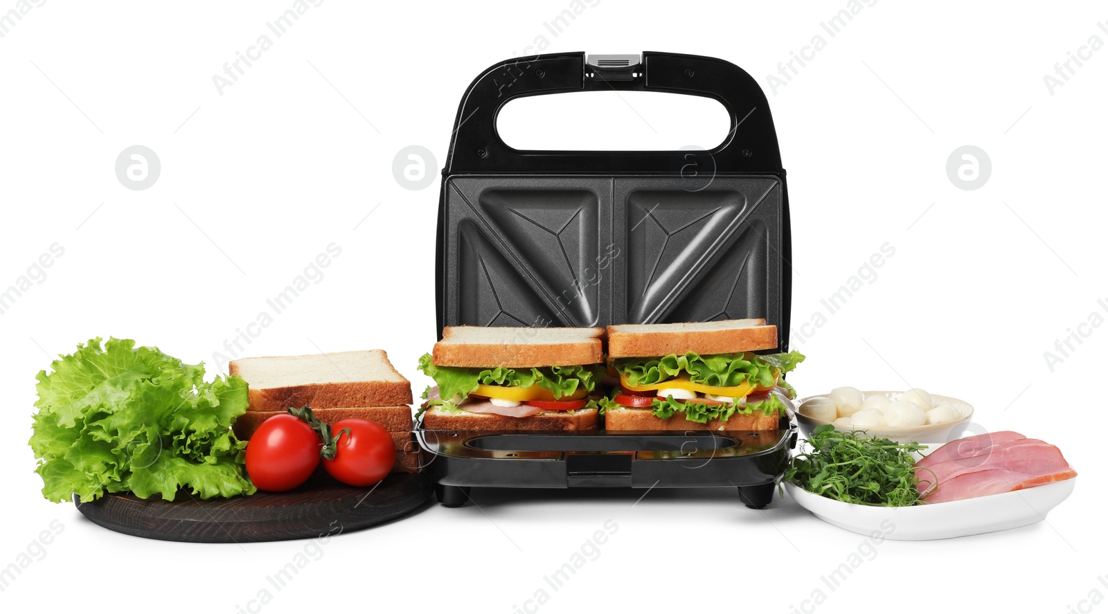 Photo of Modern grill maker with tasty sandwiches and ingredients on white background