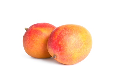 Photo of Delicious ripe juicy mangoes on white background