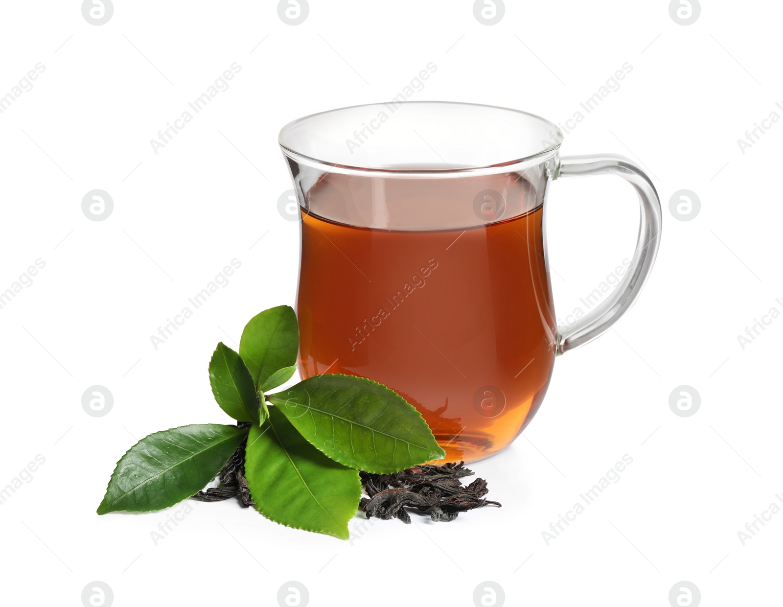 Photo of Tasty black tea with fresh and dry leaves on white background