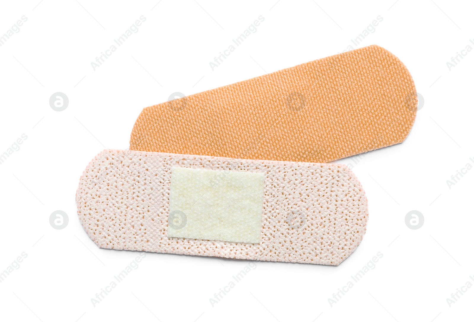 Medical sticking plasters isolated on white. First aid item Photo of Medical sticking plasters isolated on white. First aid item