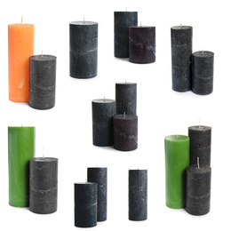 Set of color wax candles on white background