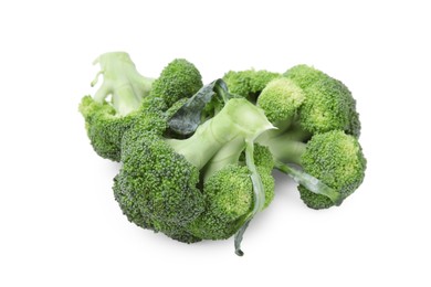 Photo of Pile of fresh raw green broccoli isolated on white