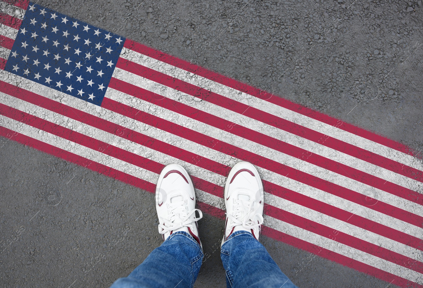 Image of Immigration. Man standing on asphalt near flag of USA, top view