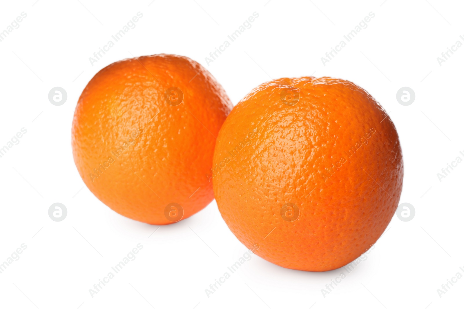 Photo of Delicious fresh ripe oranges on white background