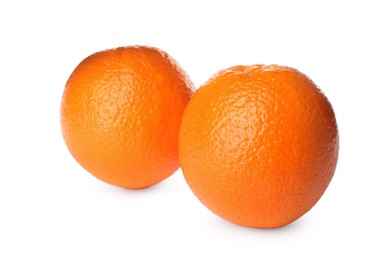 Photo of Delicious fresh ripe oranges on white background