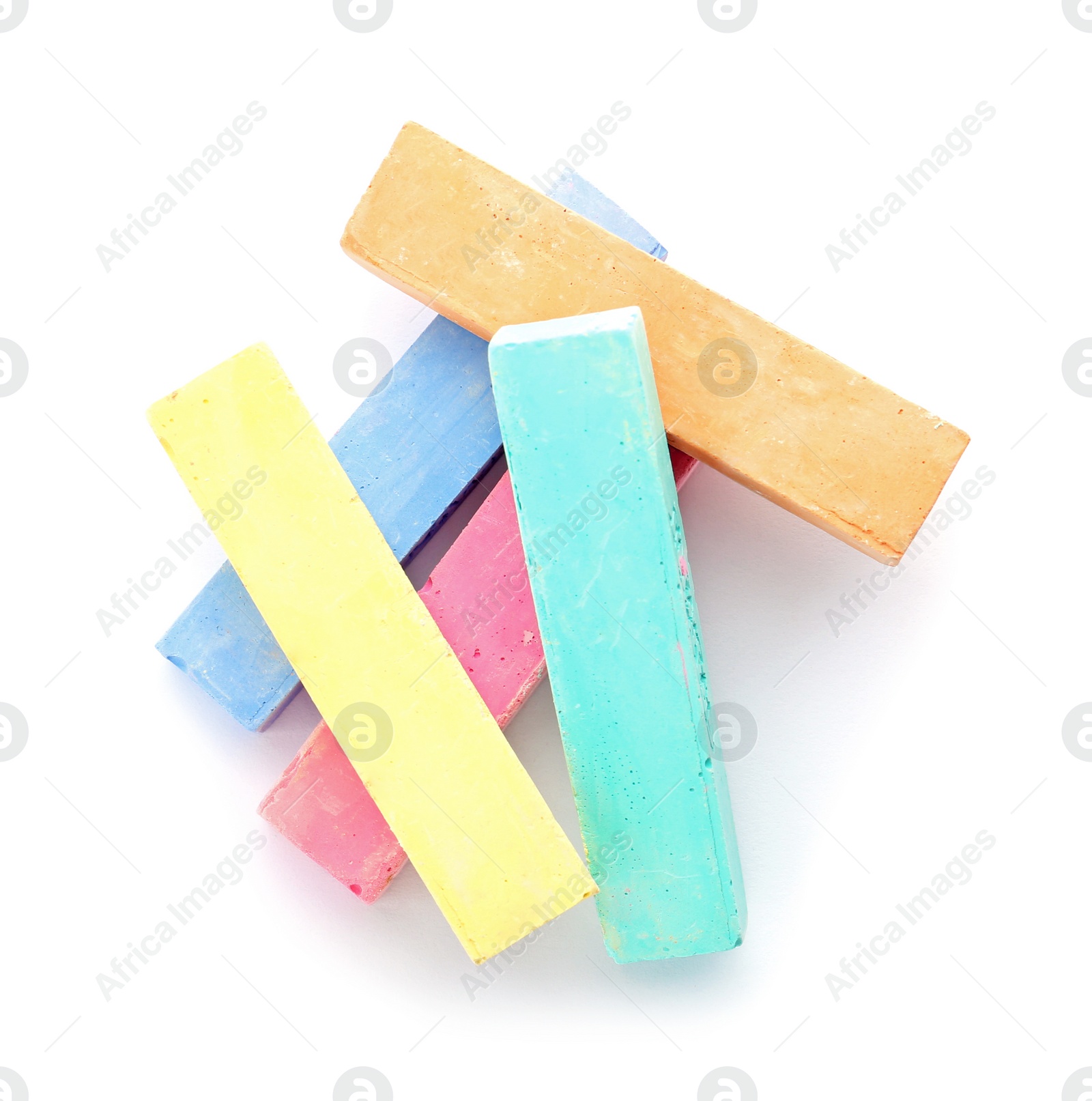 Photo of Color pieces of chalk on white background