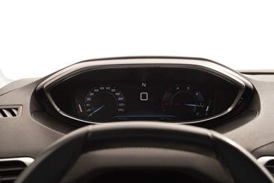 Speedometer, tachometer and steering wheel inside car