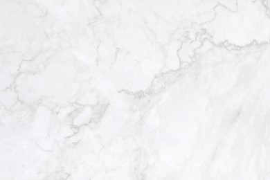 Texture of white marble surface as background, closeup