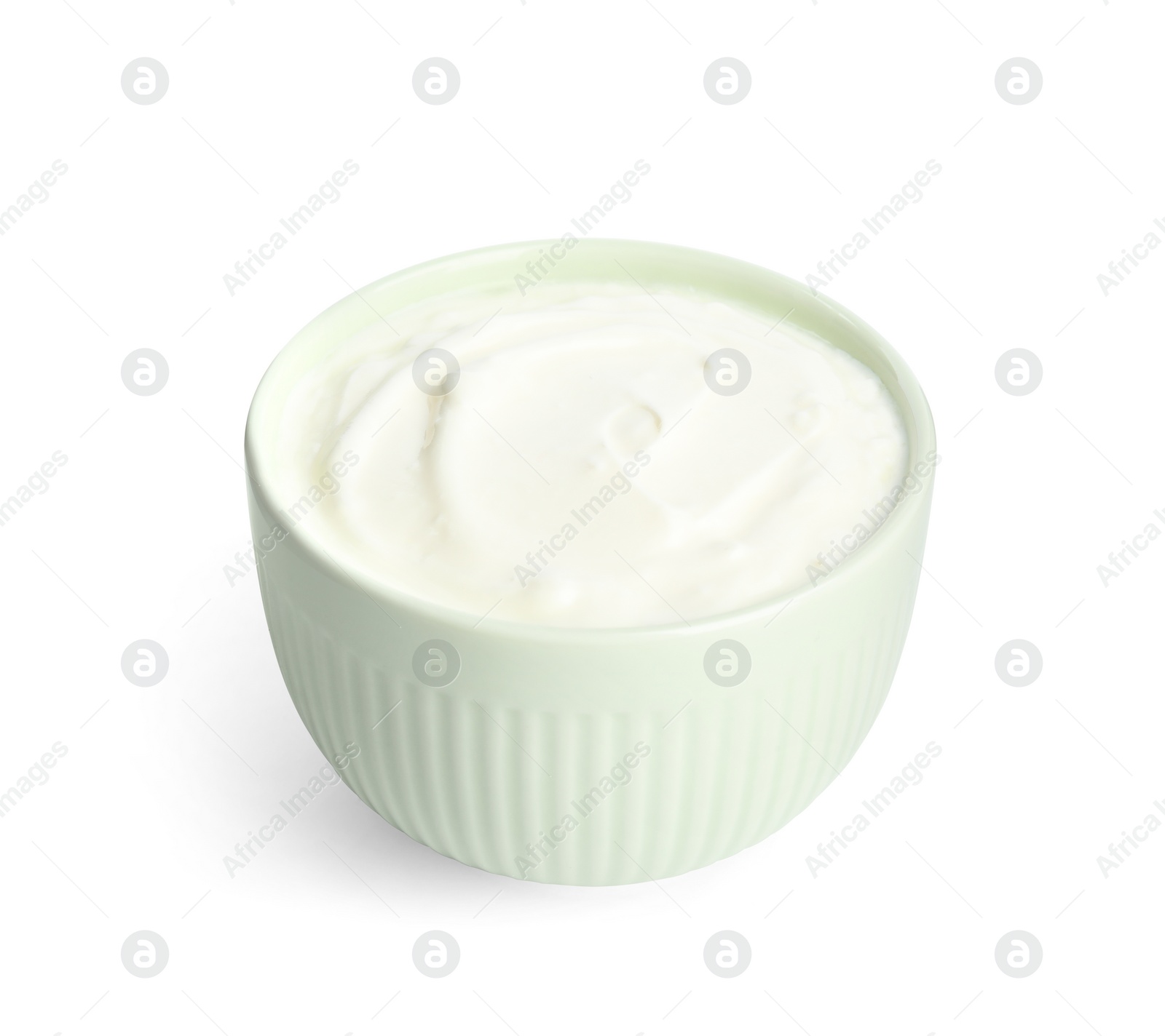 Photo of Tasty organic yogurt in bowl isolated on white